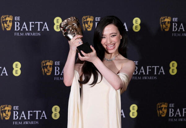 Mikey Madison poses in the winners' room with the award for the Leading Actress for "Anora", during the 2025 British Academy of Film and Television Awards (BAFTA) at the Royal Festival Hall in the Southbank Centre, London, Britain, February 16, 2025.