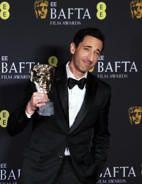 Adrien Brody poses in the winners' room with the award for the Best Leading Actor for "The Brutalist" during the 2025 British Academy of Film and Television Awards (BAFTA) at the Royal Festival Hall in the Southbank Centre, London, Britain, February 16, 2025.