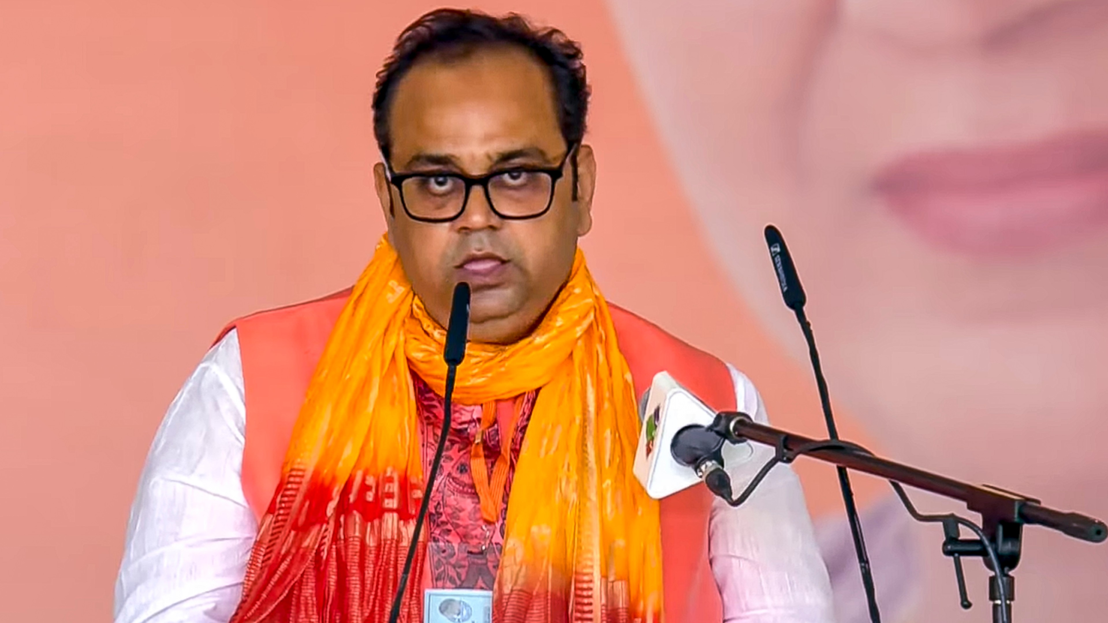 BJP MLA Pankaj Kumar Singh takes oath as a minister during the swearing-in ceremony of the Delhi government at Ramlila Maidan in New Delhi.