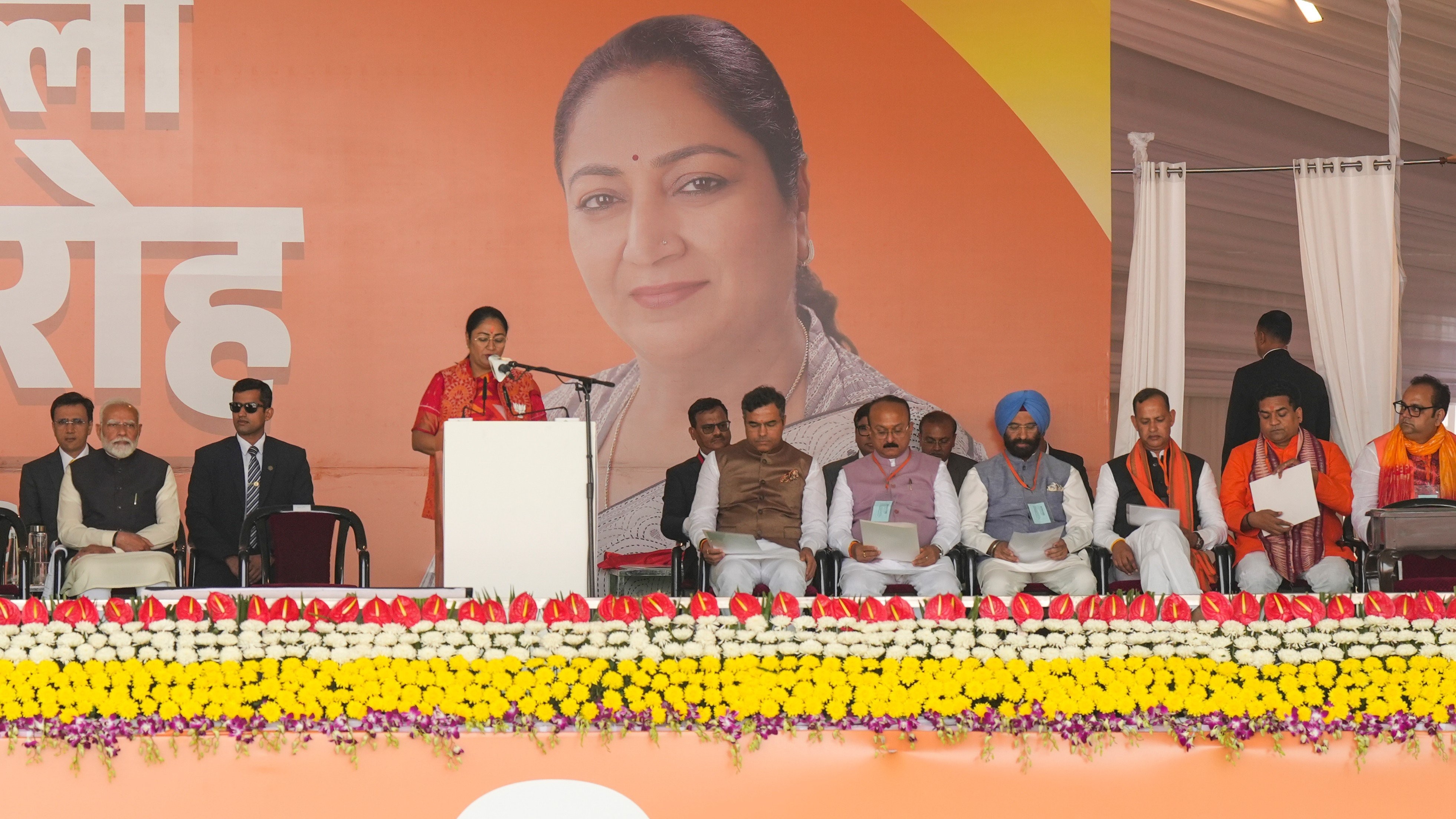 BJP leader Rekha Gupta takes oath as Delhi Chief Minister during a ceremony at Ramlila Maidan in New Delhi.