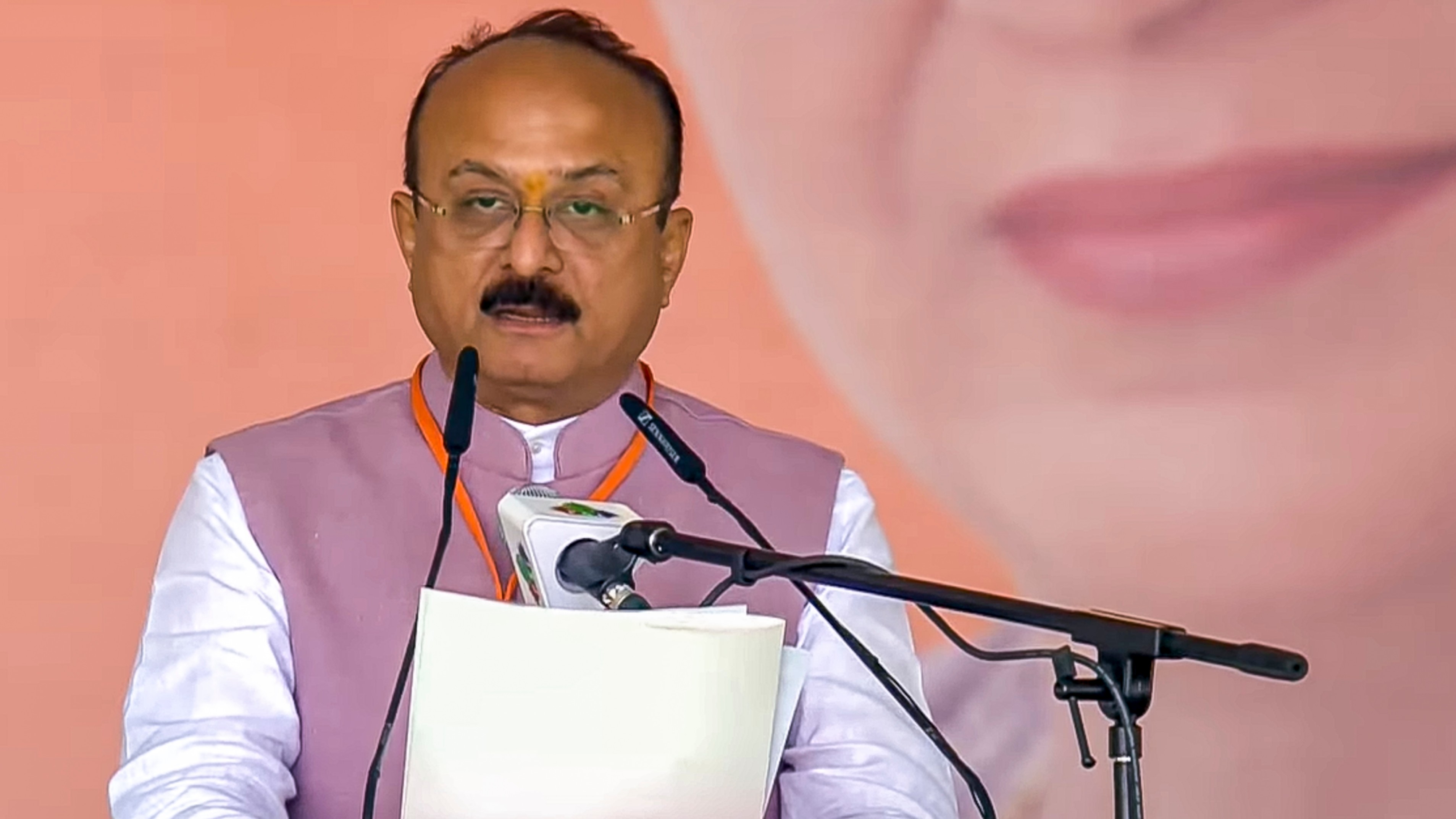 BJP MLA Ashish Sood takes oath as a minister during the swearing-in ceremony of the Delhi government at Ramlila Maidan in New Delhi.