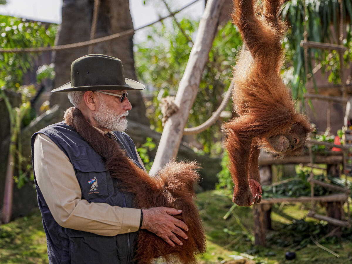 Prime Minister Narendra Modi interacts with monkeys during the inauguration of 'Vantara', in Jamnagar, Gujarat.