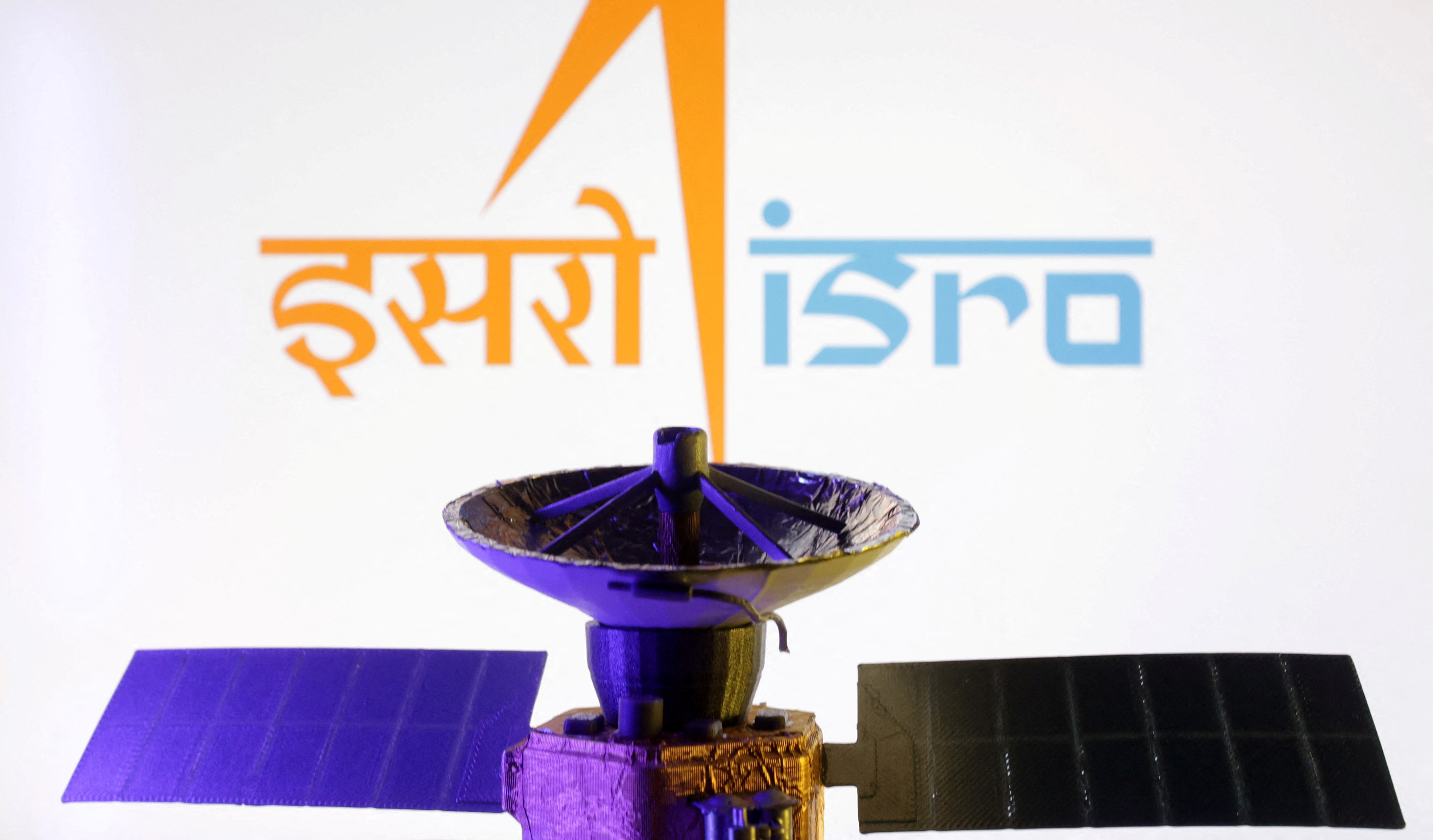 ISRO logo and miniature satellite model are seen in this illustration taken, March 10, 2025. REUTERS/Dado Ruvic/Illustration