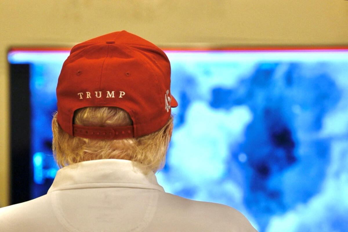 U.S. President Donald Trump looks on as military strikes are launched against Yemen's Iran-aligned Houthis over the group's attacks against Red Sea shipping, at an unspecified location in this handout image released March 15, 2025.