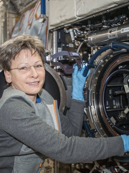 Peggy Whitson holds the record for the most days spent in space by an astronaut. She has successfully completed multiple missions and spent a total of 665 days.