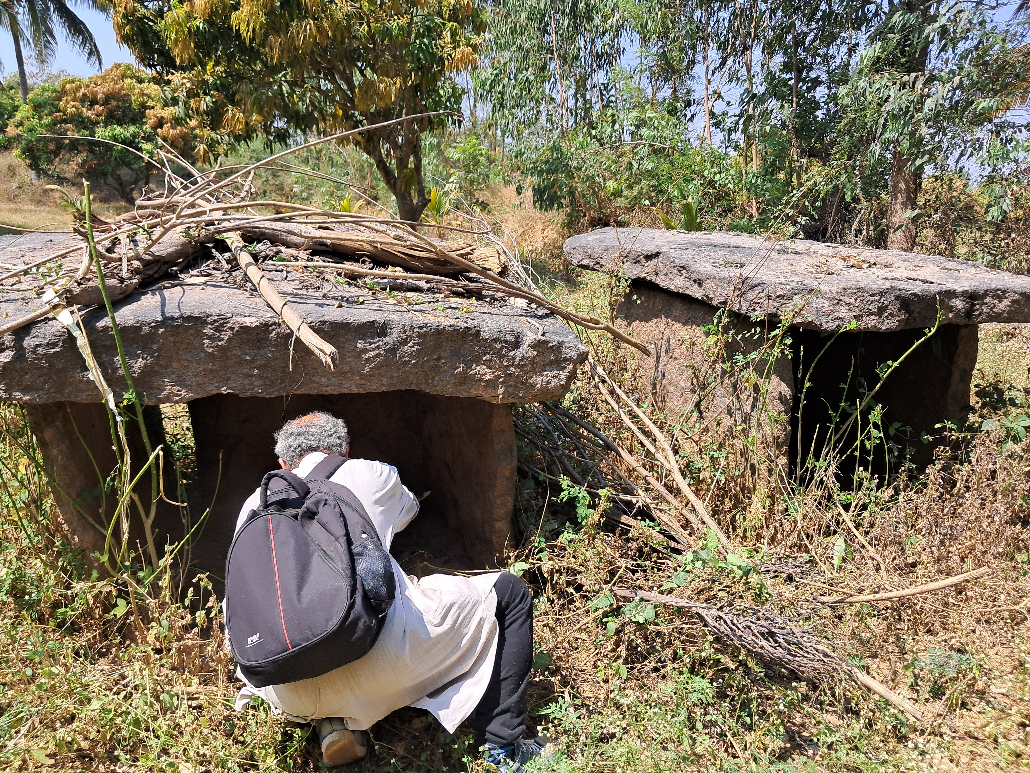 Clearing the entry to dolmens at Karlamangala