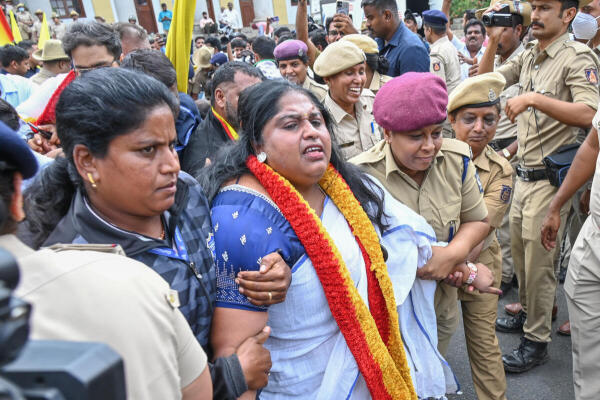 Kannada activists being detained by police due to Karnataka Bandh call by pro-Kannada organisations near Town Hall in Bengaluru.