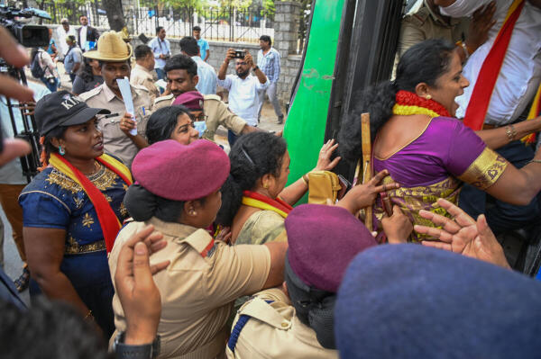 Kannada activists detained by police due to Karnataka Bandh call by pro-Kannada organisations near Town Hall in Bengaluru. 