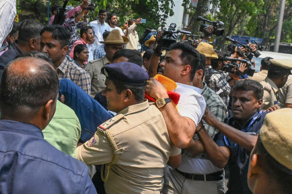 Kannada activists being detained by police due to Karnataka Bandh call by pro-Kannada organisations near Town Hall in Bengaluru.