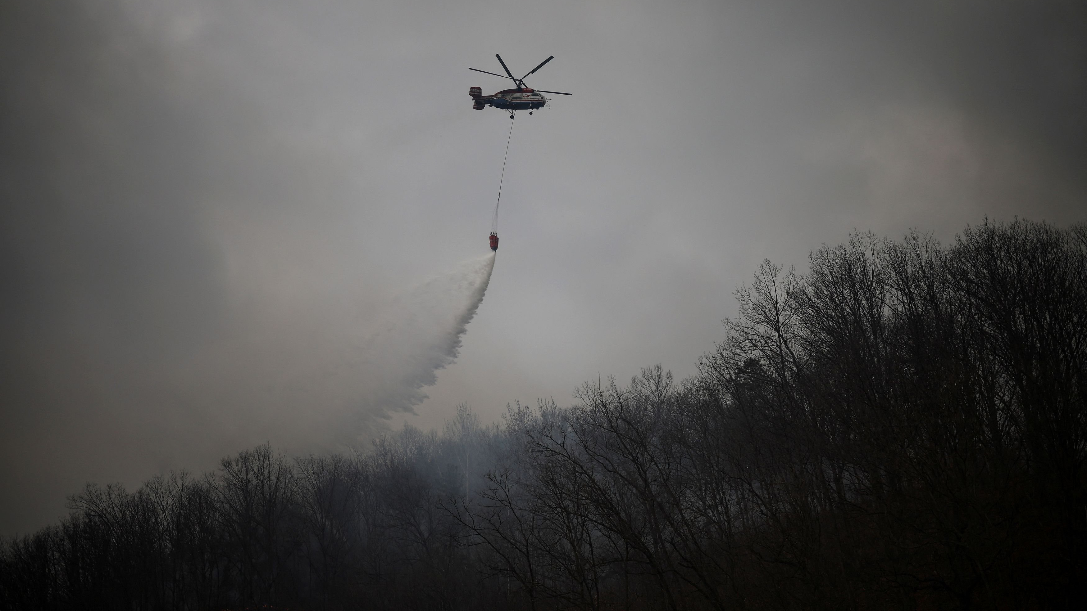South Korea hopes to use break in weather to contain deadly wildfires 