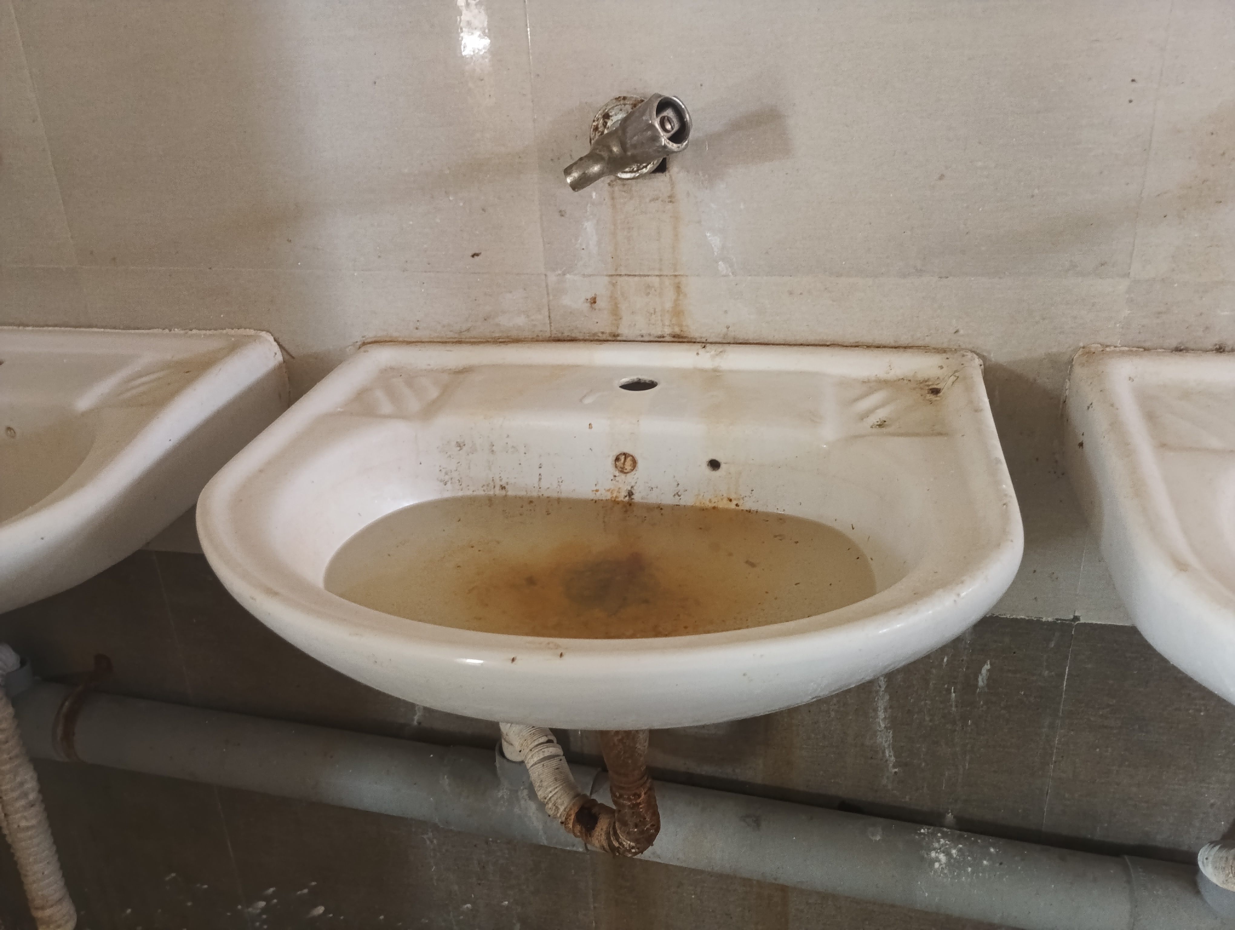 A  waterlogged sink at a hostel in Kolar district.