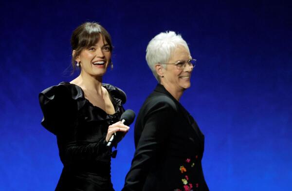 Emma Mackey and Jamie Lee Curtis arrive to promote upcoming movie “Ella McCay” during a Walt Disney Studios presentation at CinemaCon, the official convention of Cinema United, in Las Vegas, Nevada.