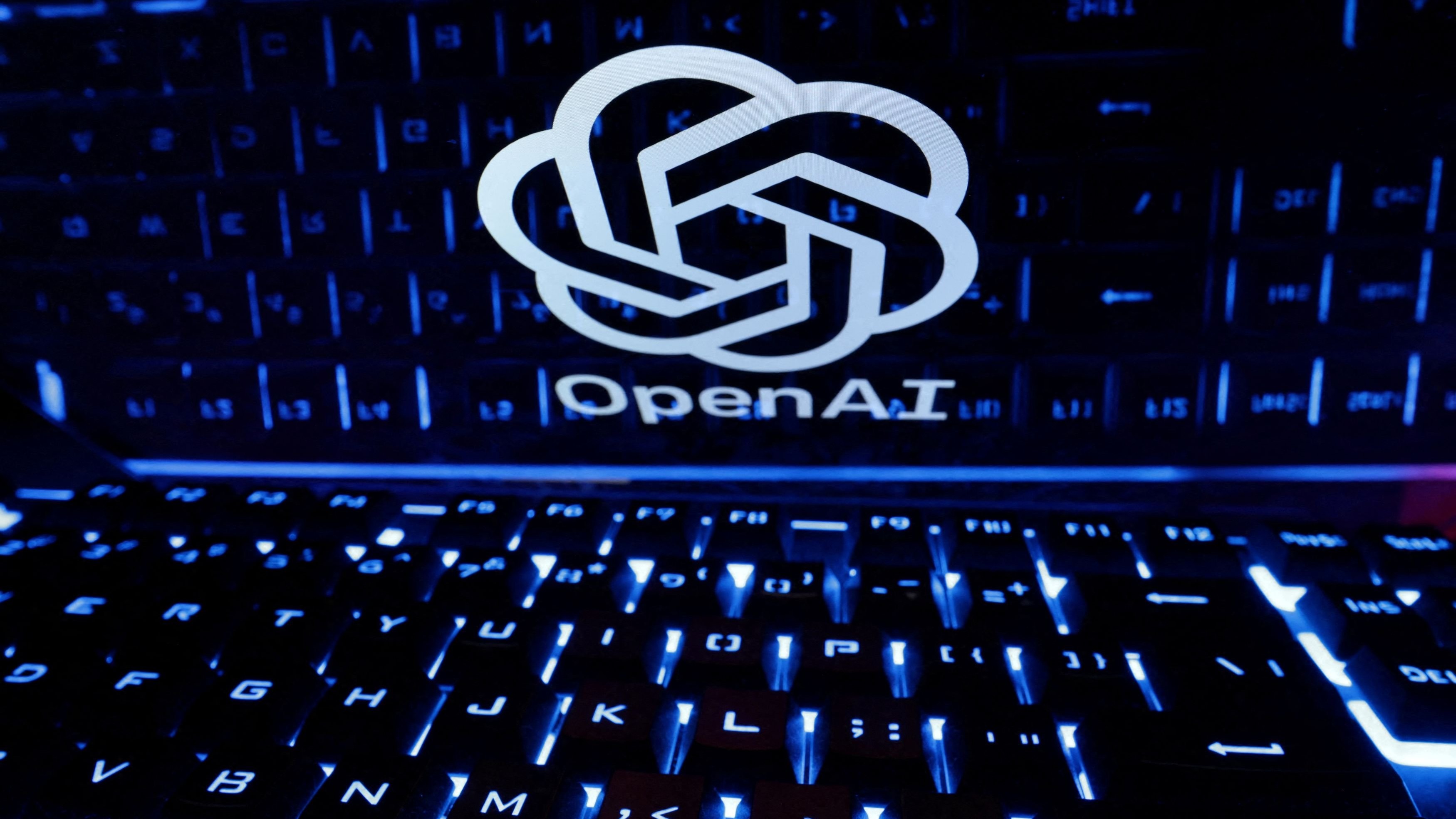 FILE PHOTO: A keyboard is placed in front of a displayed OpenAI logo in this illustration taken February 21, 2023.