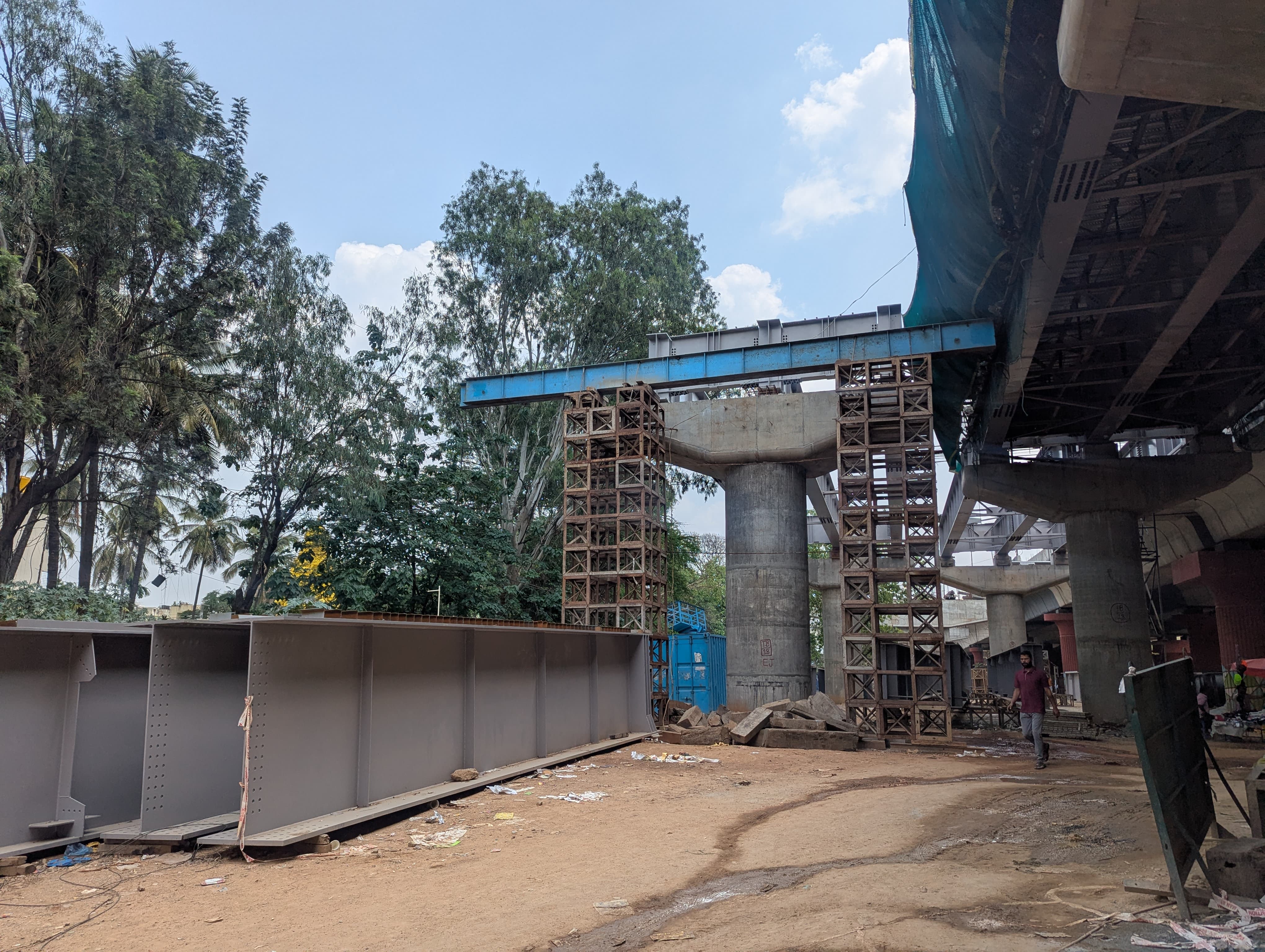 Girders waiting to be erected on top of the pillars. DH Photo/Udbhavi Balakrishna