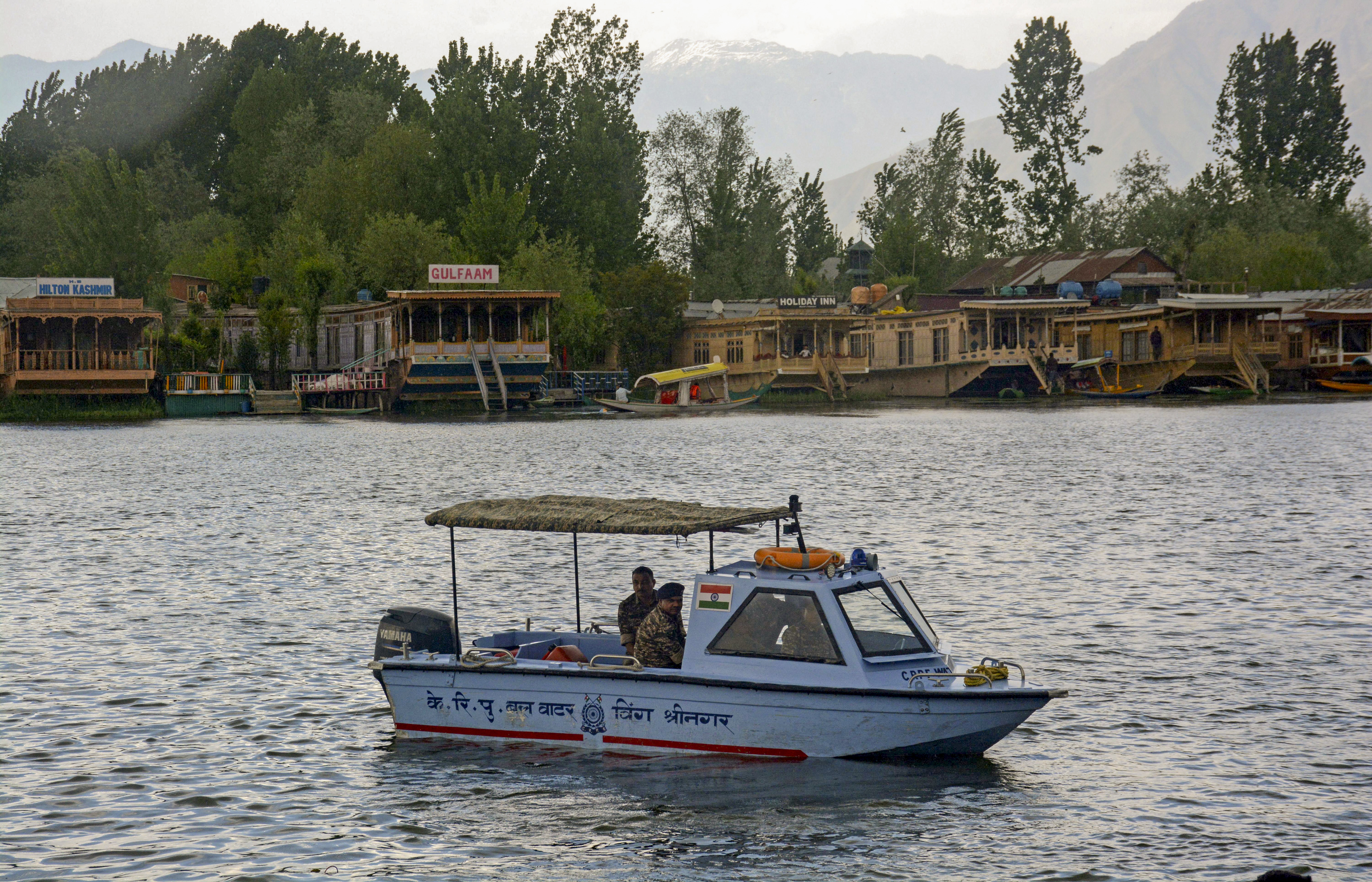 Srinagar: Security personnel patrol at the Dal Lake amid high alert after the Pahalgam terror attack in Srinagar Wednesday April 23 2025. At least 26 people were killed in the terrorist attack in J&K