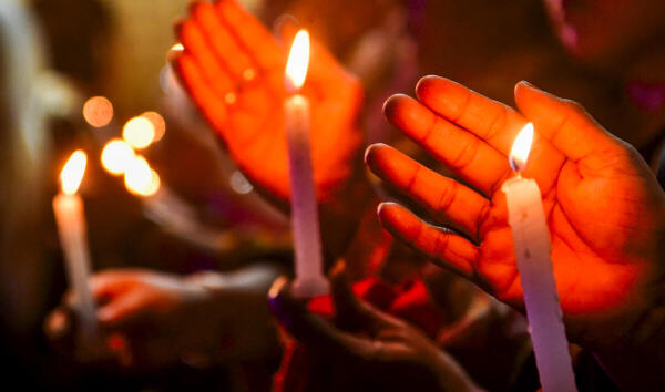People hold a candlelight vigil to pay tribute to the victims of terrorist attack in J&amp;K's Pahalgam, in Kolkata, Thursday, April 24, 2025. 