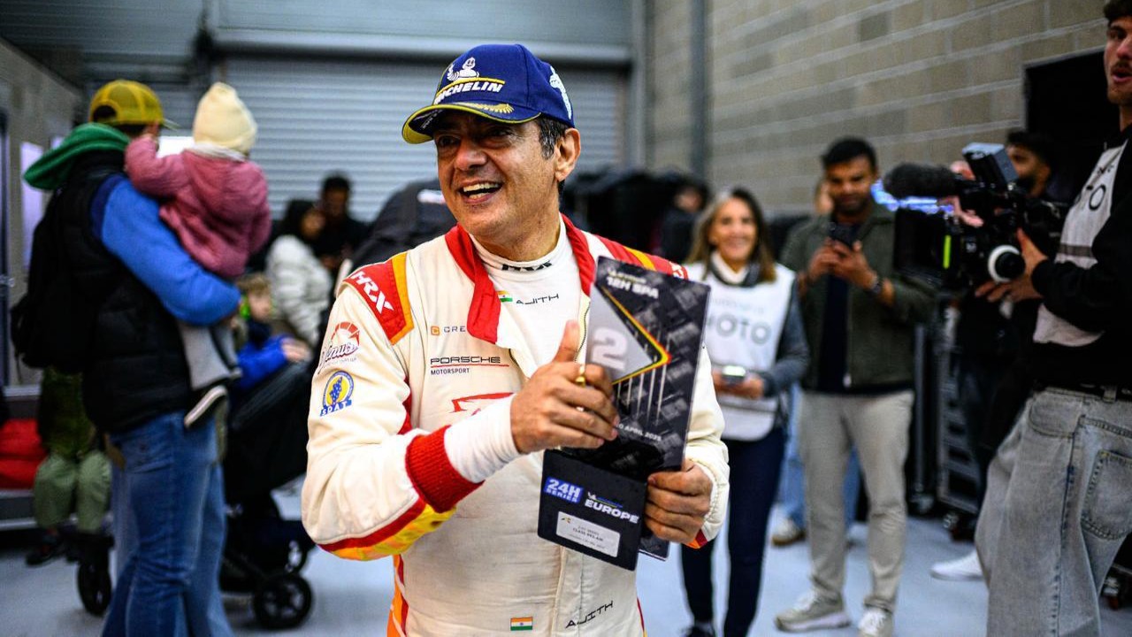 Ajith Kumar with the trophy during the Porsche 992 GT3 Cup at Spa-Francorchamps in Belgium.