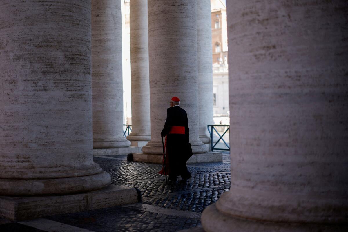 A cardinal walks in St. Peter's Square ahead of the conclave which will be held on May 7, at the Vatican, April 29, 2025. 
