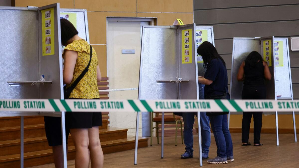 Singapore votes amid US-China trade tensions, ruling PAP seeks fresh mandate