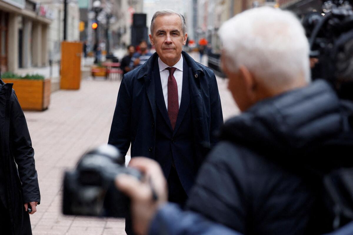 Canada's Prime Minister Mark Carney arrives to his first press conference since forming government in Ottawa, Ontario, Canada May 2, 2025. 