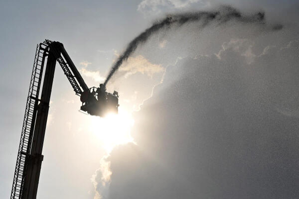 Civil defence and emergency services personnel take part in mock drill 'Operation Abhyaas' at Halasuru, Bengaluru
