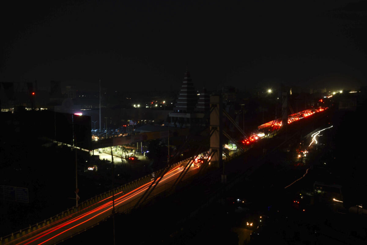 Vehicles stuck on an overbridge during a power blackout as part of the nationwide civil defence mock drill 'Operation Abhyaas', in Patna.