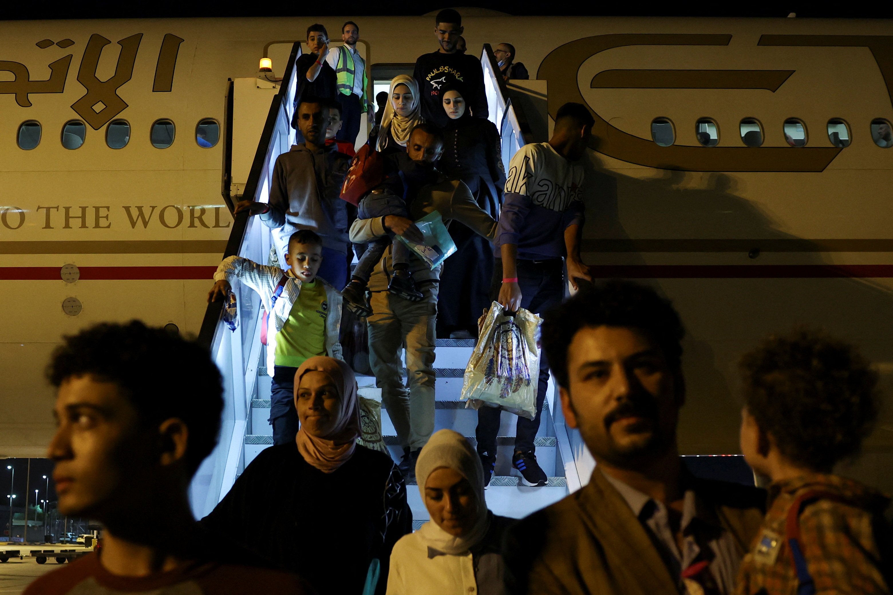 Palestinian evacuees from Gaza, including patients and their escorts, arrive in Abu Dhabi, United Arab Emirates