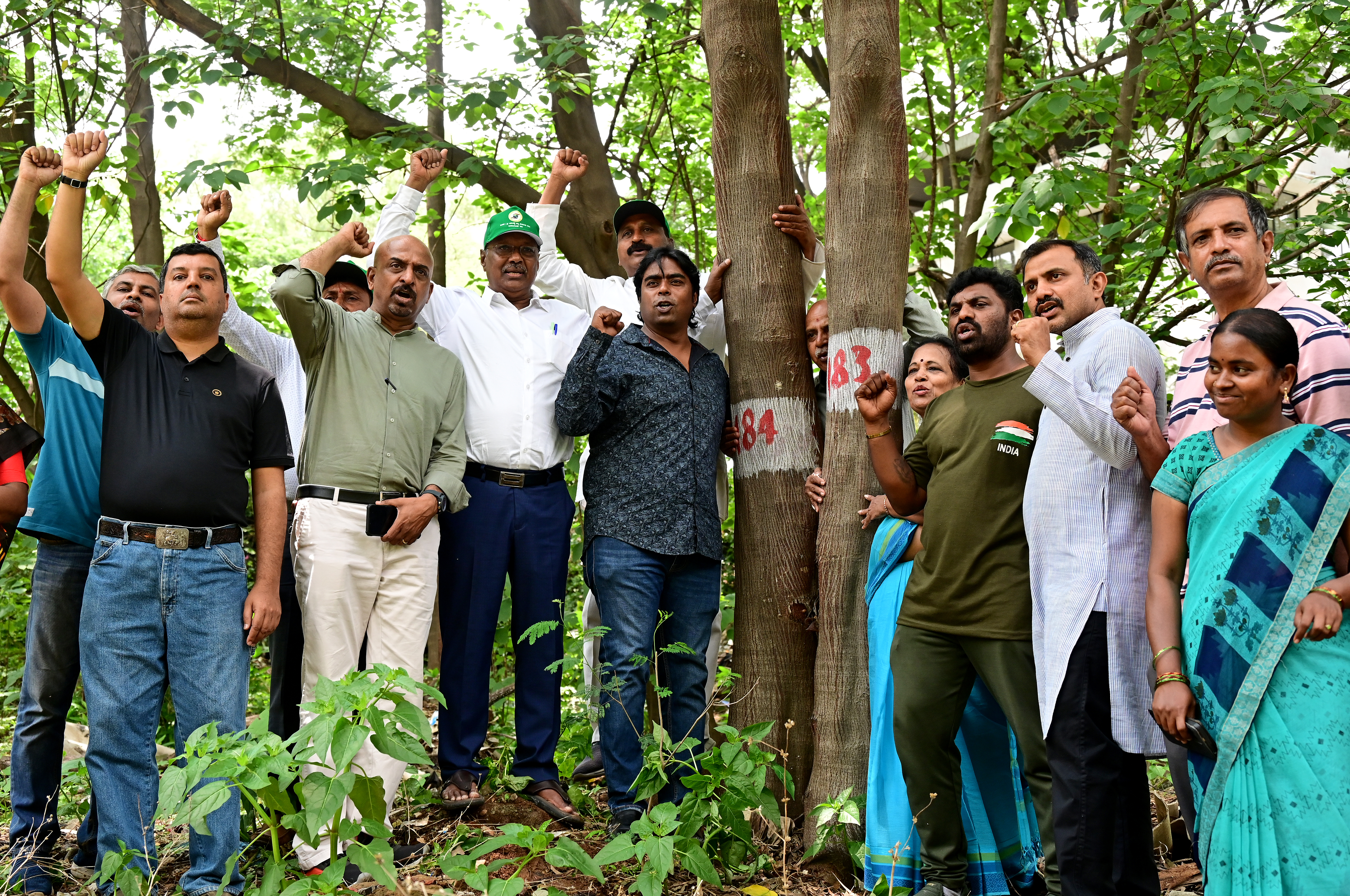 Activists protest at the colony premises on Thursday. DH PHOTO/RANJU P
