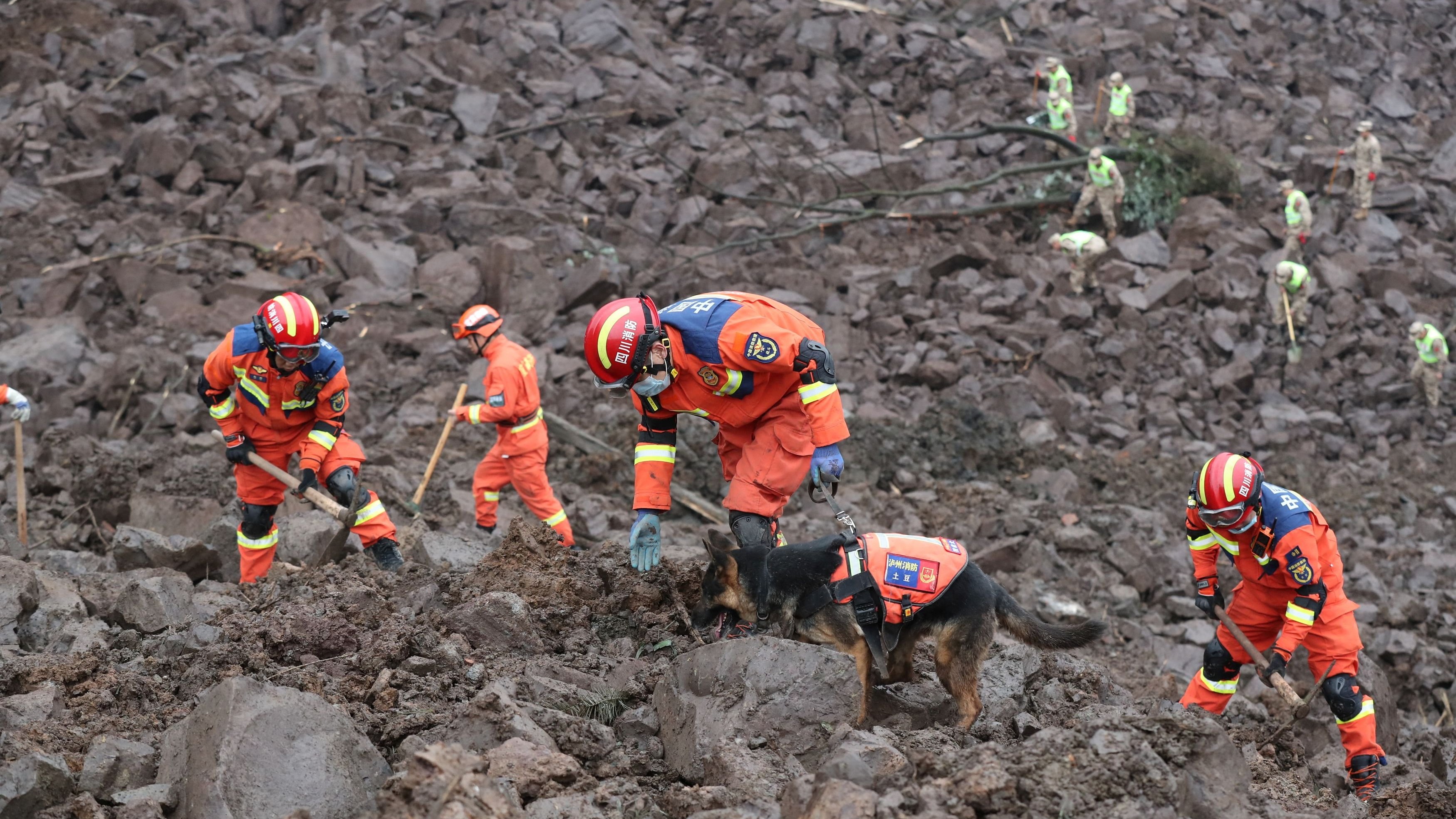 2 killed, 19 trapped in landslides in China