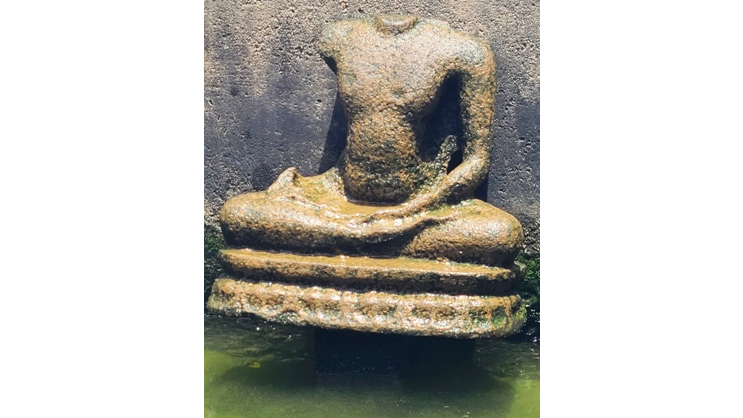 Disfigured Buddha statue fished out from Kadri temple pond in Mangaluru