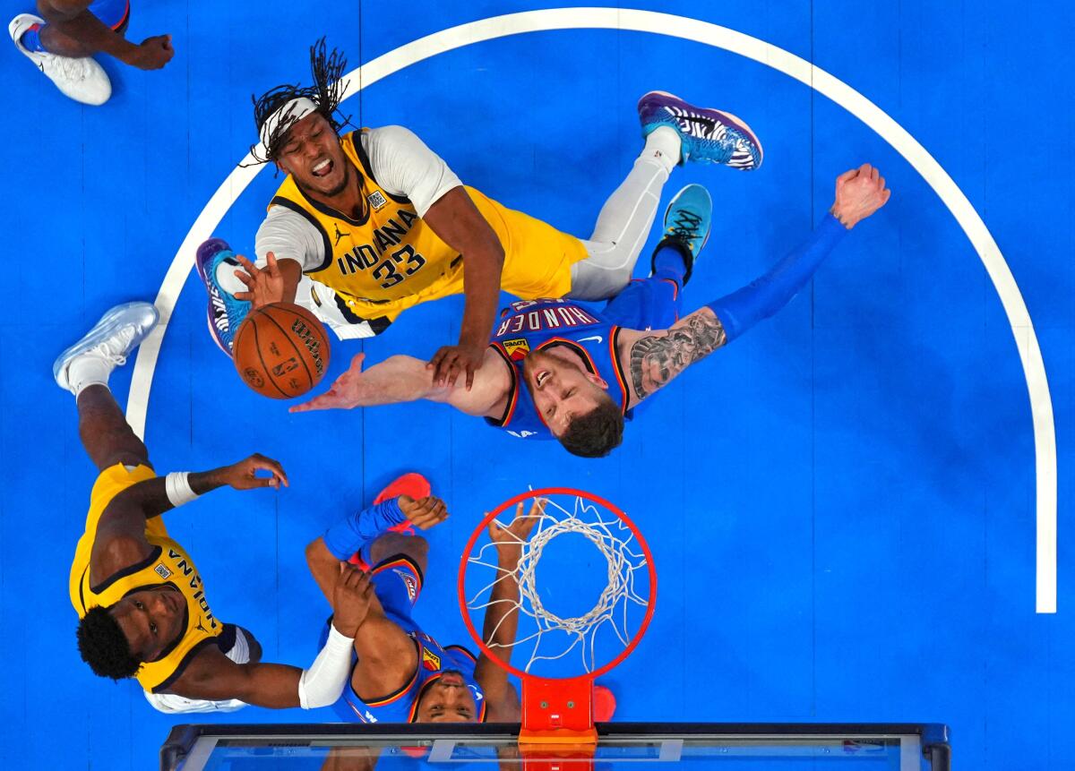 Indiana Pacers center Myles Turner (33) shoots the ball against Oklahoma City Thunder center Isaiah Hartenstein (55) during the first half during game two of the 2025 NBA Finals at Paycom Center.