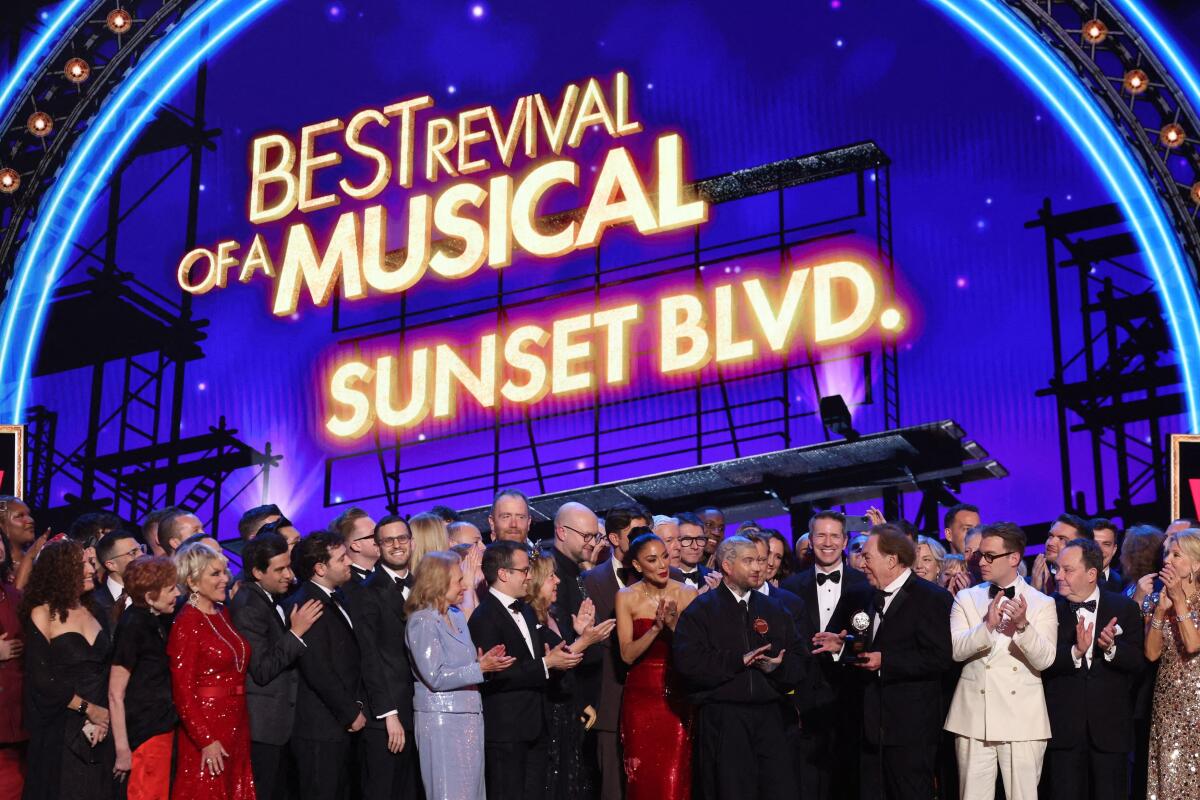 Jamie Lloyd and Andrew Lloyd Webber accept Best Revival of a Musical for "Sunset Blvd." at the 78th Annual Tony Awards in New York City, U.S., June 8, 2025.