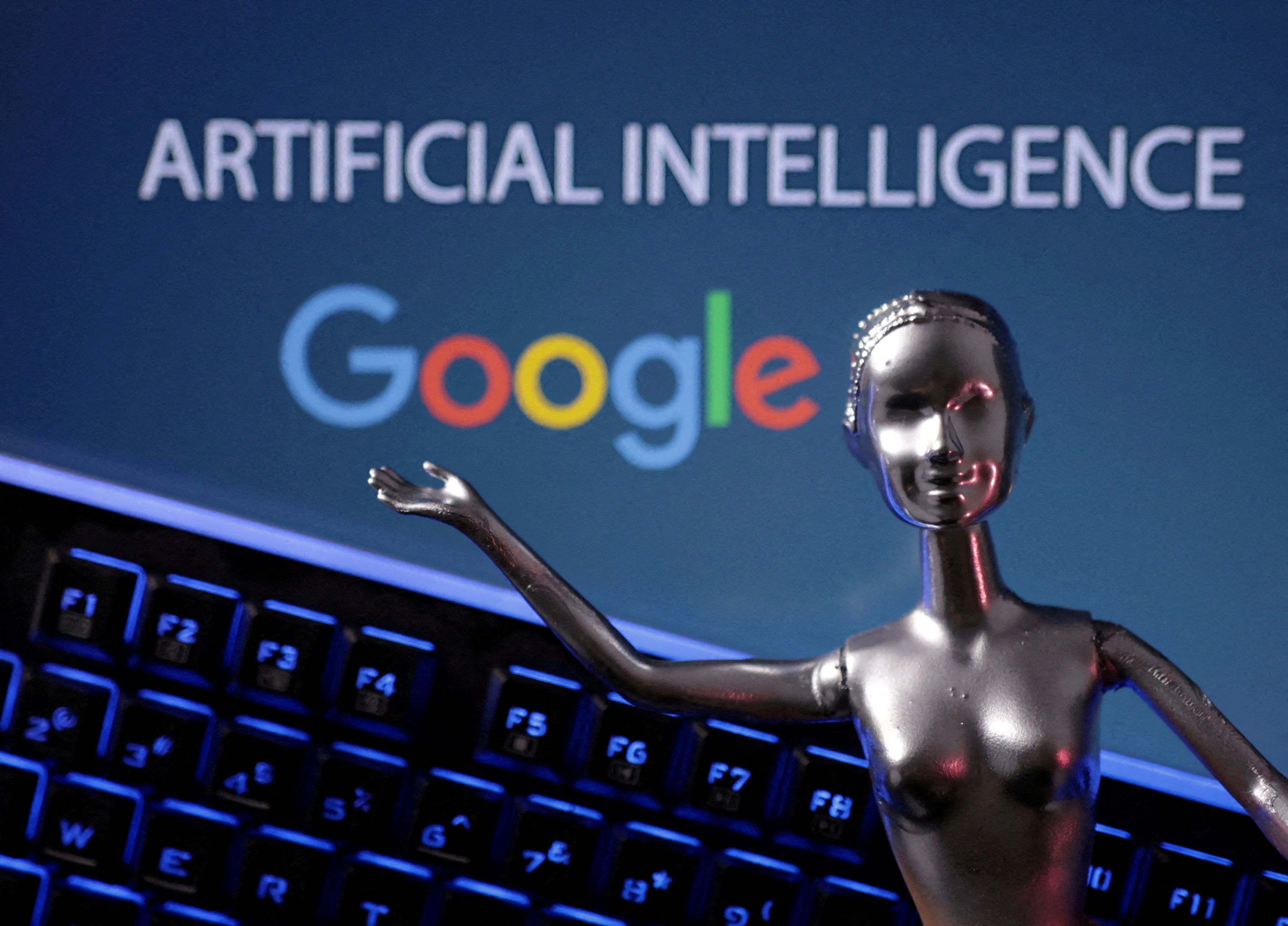 FILE PHOTO: Google logo and AI Artificial Intelligence words are seen in this illustration.