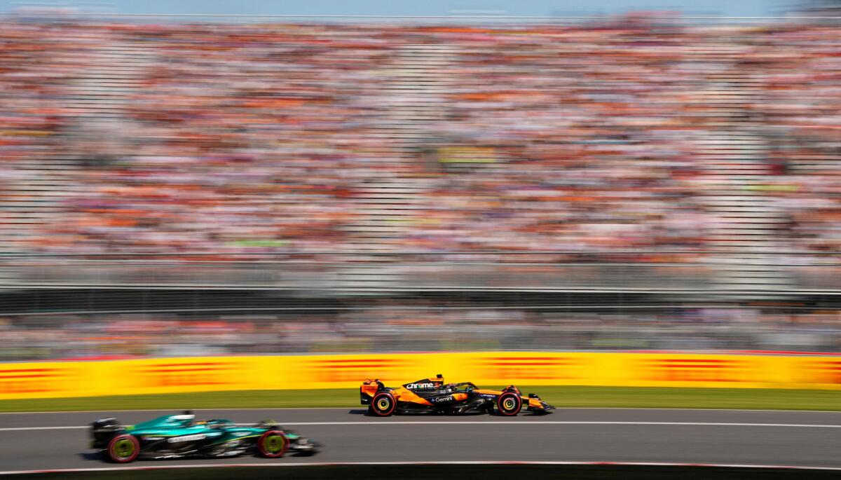 Formula One F1 - Canadian Grand Prix - Circuit Gilles Villeneuve, Montreal, Quebec, Canada - June 14, 2025 McLaren's Oscar Piastri and Aston Martin's Lance Stroll during qualifying.