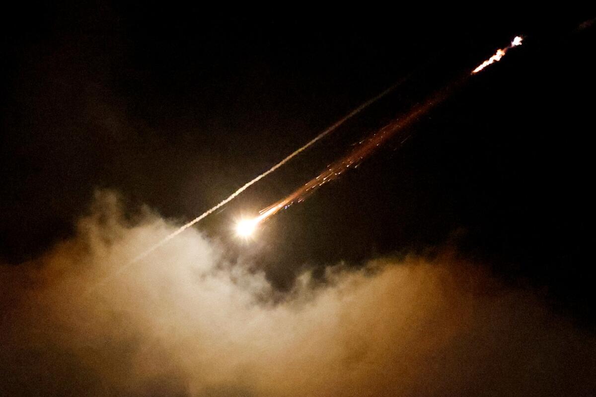 A missile launched from Iran towards Israel is seen from Ramallah, Israeli-occupied West Bank, June 16, 2025.