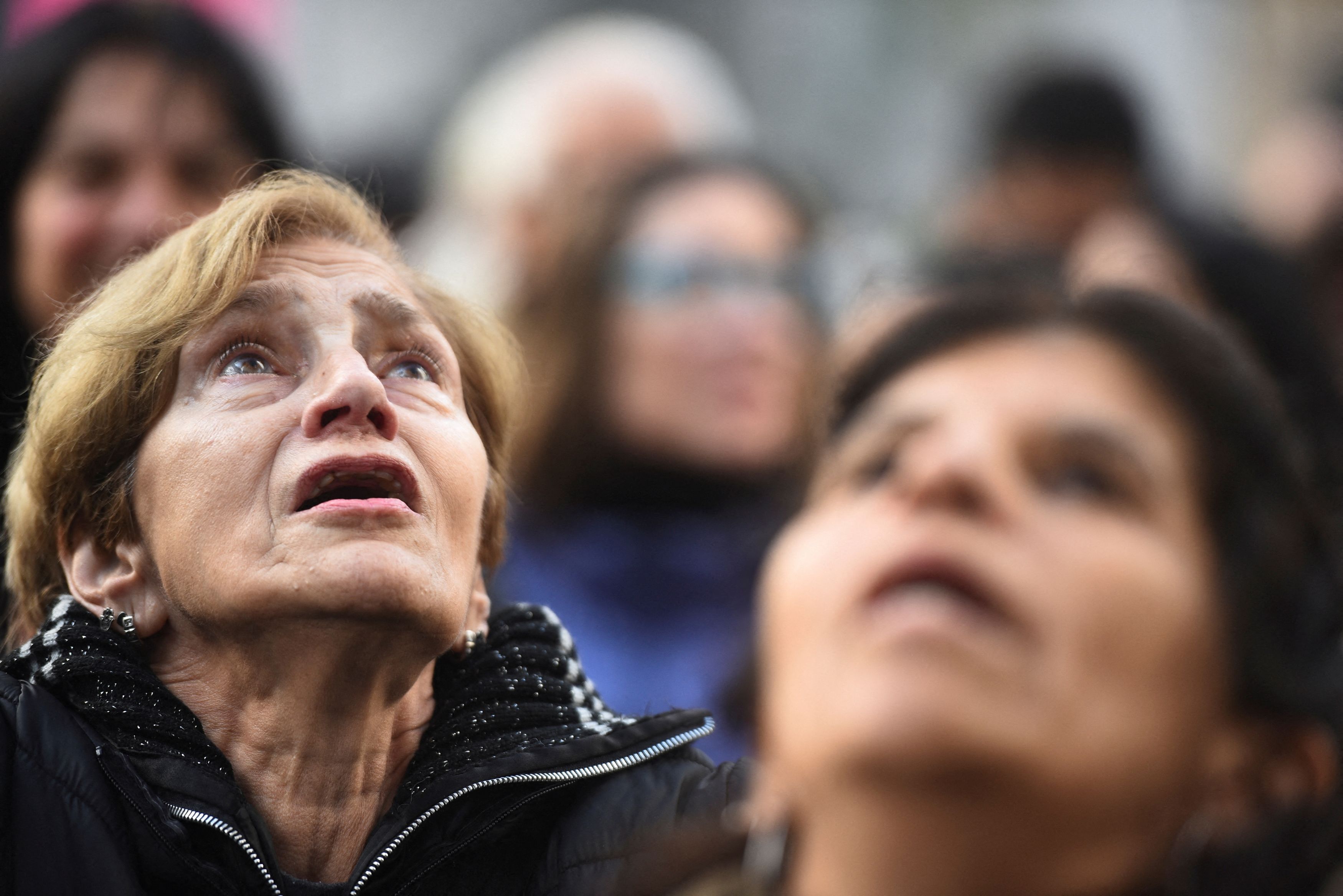 Supporters of Argentina's former President Cristina Fernandez de Kirchner gather outside of her house, after an Argentine judge approved her request to serve out her six-year prison sentence for corruption at home, in Buenos Aires, Argentina, June 17, 2025.