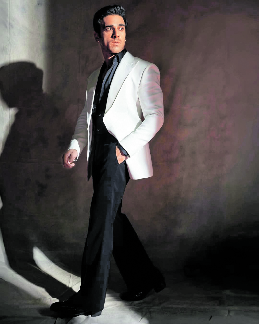 Bold minimalism
Pulkit Samrat’s take on the white blazer is all about bold minimalism and sharp tailoring with a relaxed fit. His recent outing proved just that - he looked impeccably stylish with a blazer that highlighted his toned physique and confident stance perfectly. Paired with relaxed fit trousers and sleek shoes Pulkit’s look was polished and contemporary showing how a well-fitted yet relaxed blazer can elevate one’s presence.