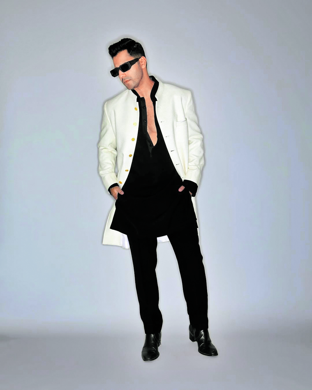 Youthful energy
Varun Dhawan infuses youthful energy into the white blazer mixing classic style with playful accessories. Whether it’s a vibrant pocket square or statement shoes Varun adds a twist that keeps his look fresh and relevant. His ability to blend tradition with modern trends makes him a standout in the blazer game.