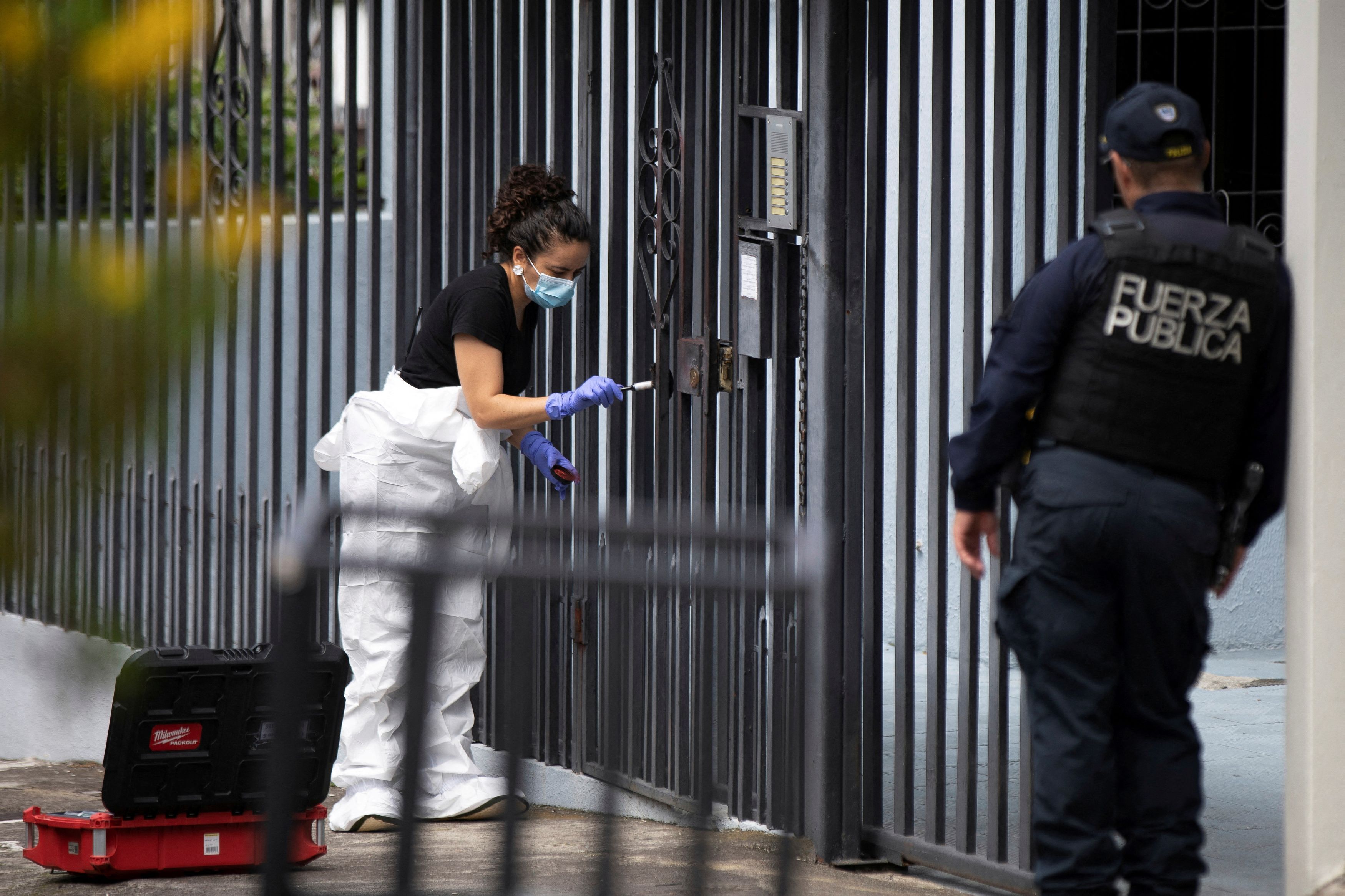 A forensic technician works a crime scene where exiled former Nicaraguan military officer Roberto Samcam was killed at his home, in San Jose, Costa Rica June 19, 2025.