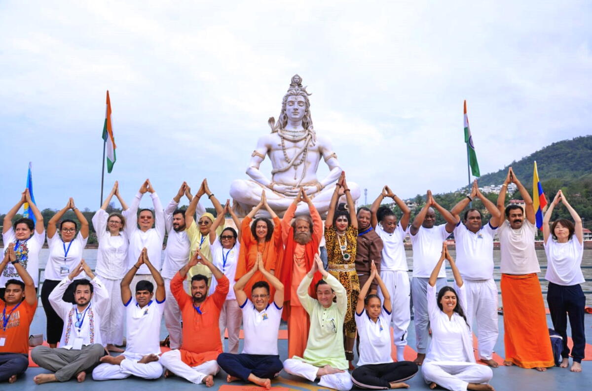 Ambassadors and High Commissioners of various countries take part in a yoga session under the guidance of Parmarth Niketan President Swami Chidanand Saraswati and Sadhvi Bhagawati Saraswati, organised to mark the International Day of Yoga, on the banks of the Ganga river at Parmarth Niketan, in Rishikesh.