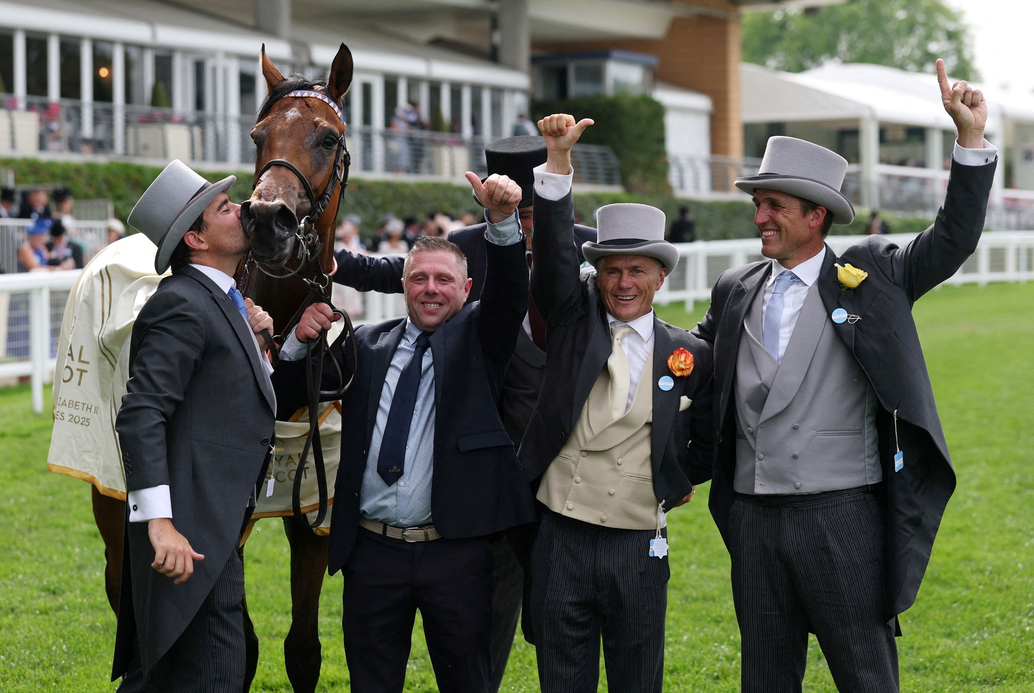Trainer Jerome Reyner kisses Lazzat after winning the 15:40 Queen Elizabeth II Jubilee Stakes