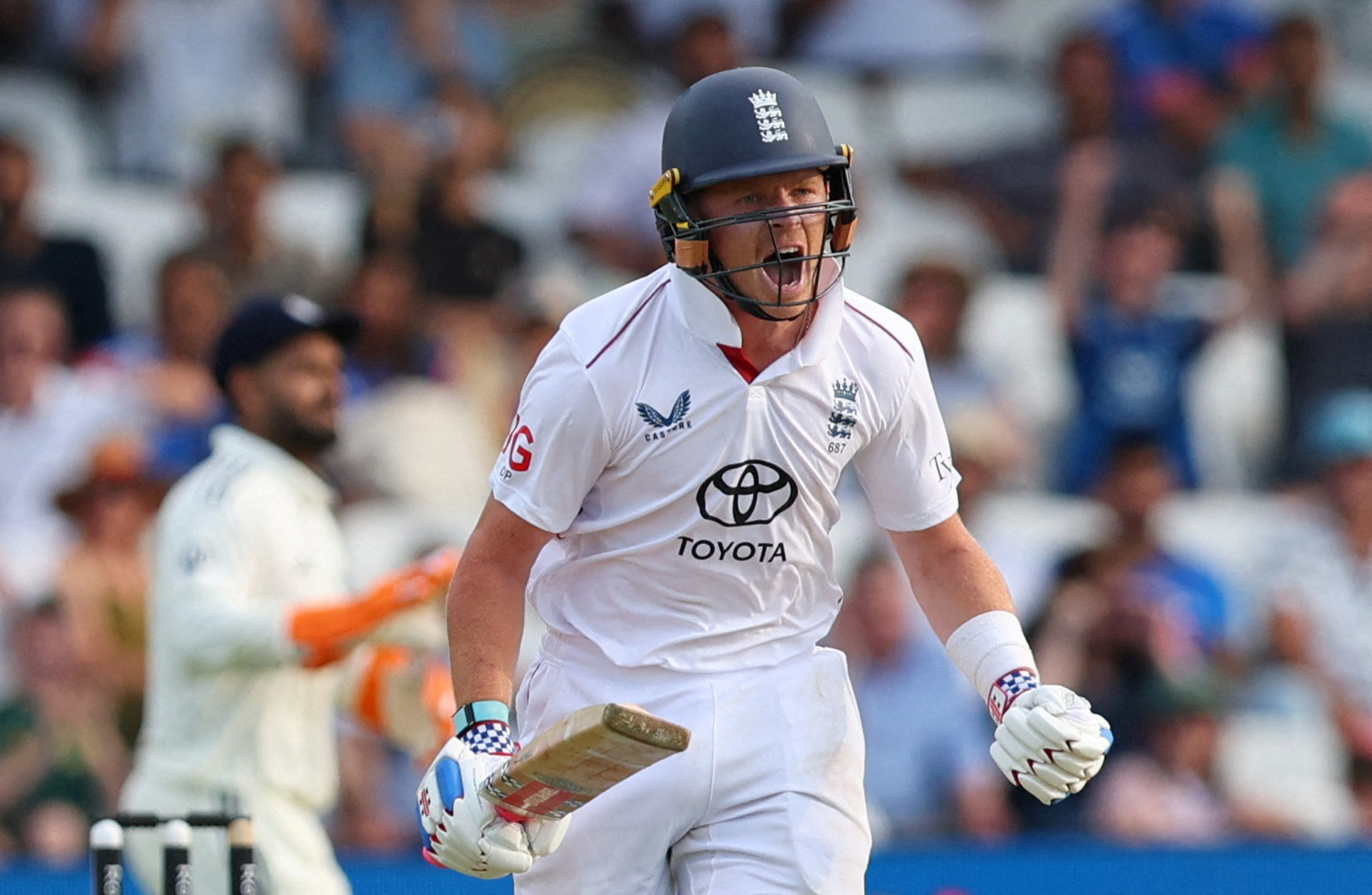 England's Ollie Pope celebrates after reaching his century against India, June 21, 2025.
