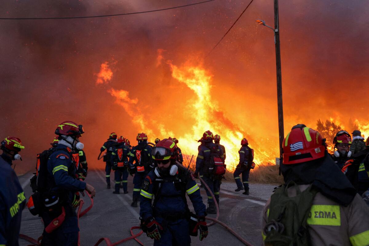 Greece battles wildfire on Chios island, fanned by strong winds
