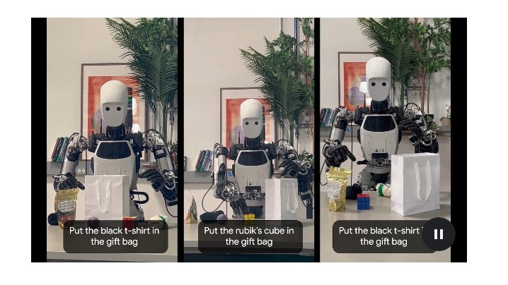Robots running Gemini Robotics on-device model to perform basic tasks such as placing a t-shirt and Rubik's cube in a gift bag.