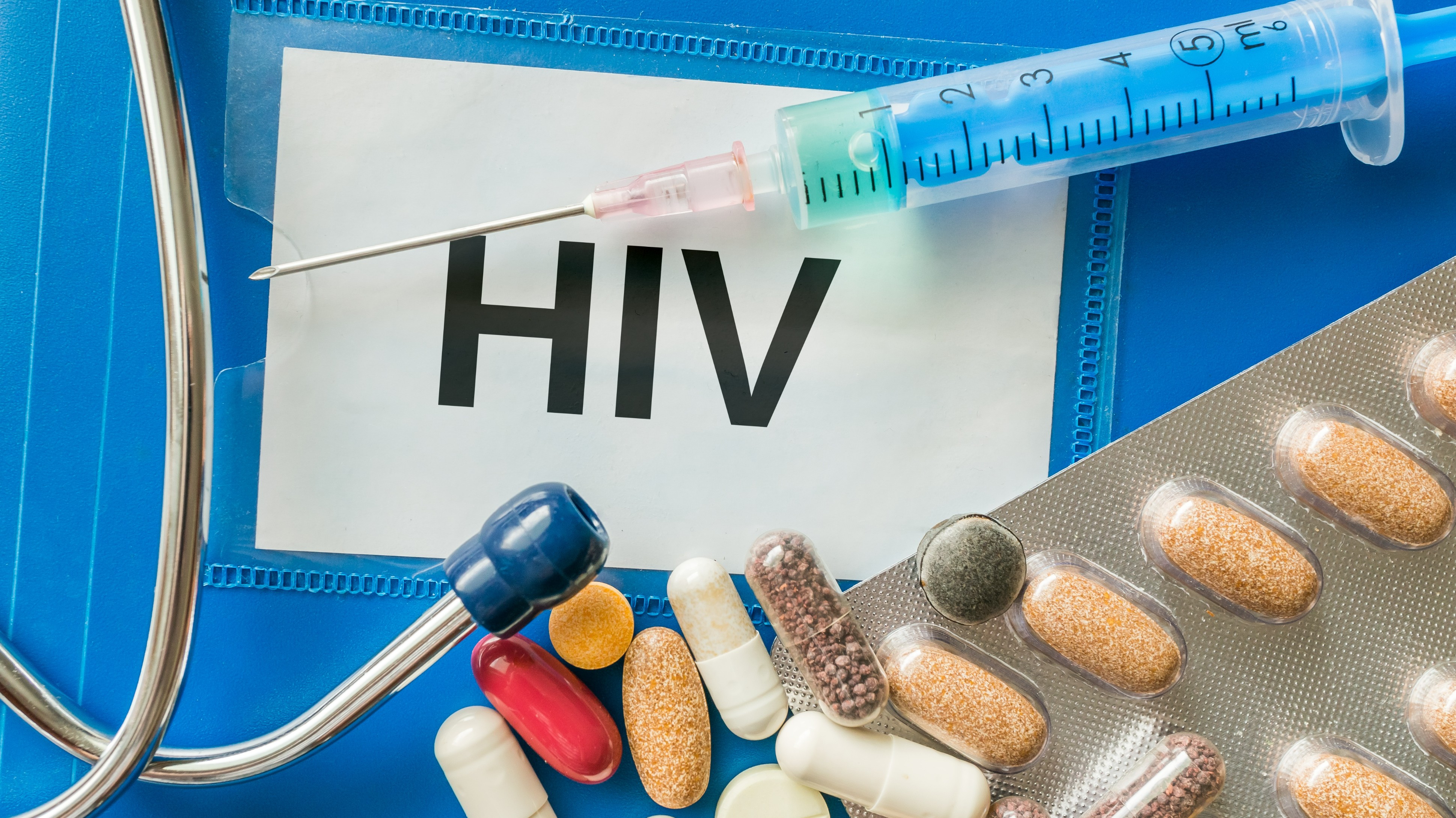 We have drugs to manage HIV. So why are we spending millions looking for cures?