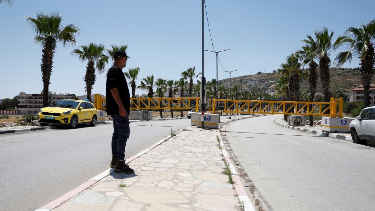 West Bank town becomes 'big prison' as Israel fences it in