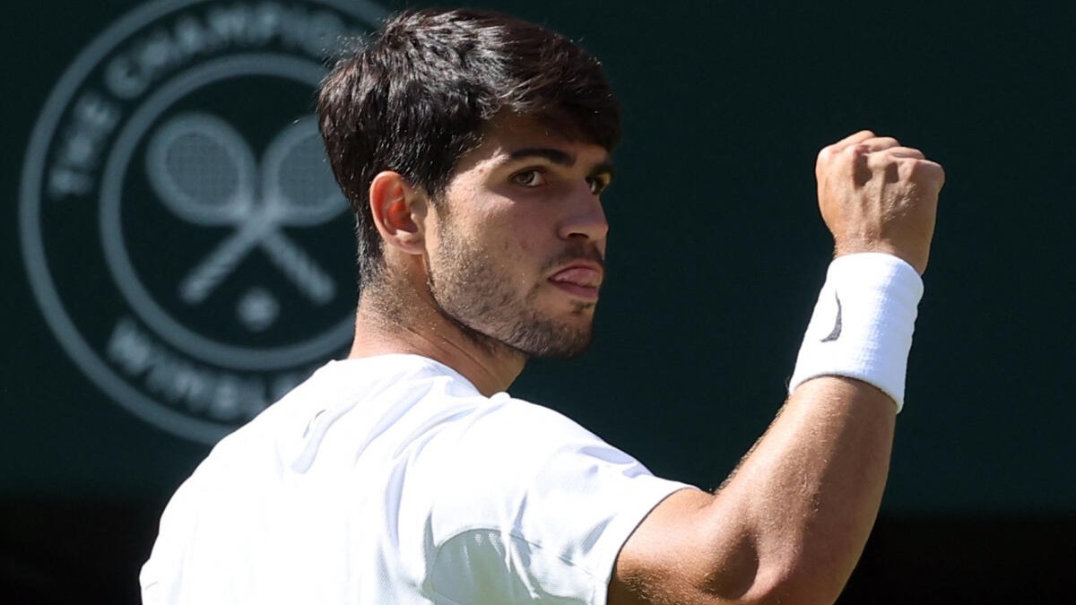 Alcaraz muscles past Fritz to reach Wimbledon final