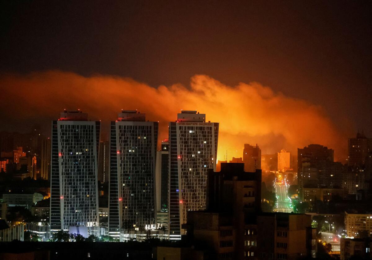 An explosion of a drone lights up the sky over the city during a Russian drone and missile strike, amid Russia's attack on Ukraine, in Kyiv, Ukraine July 10, 2025.