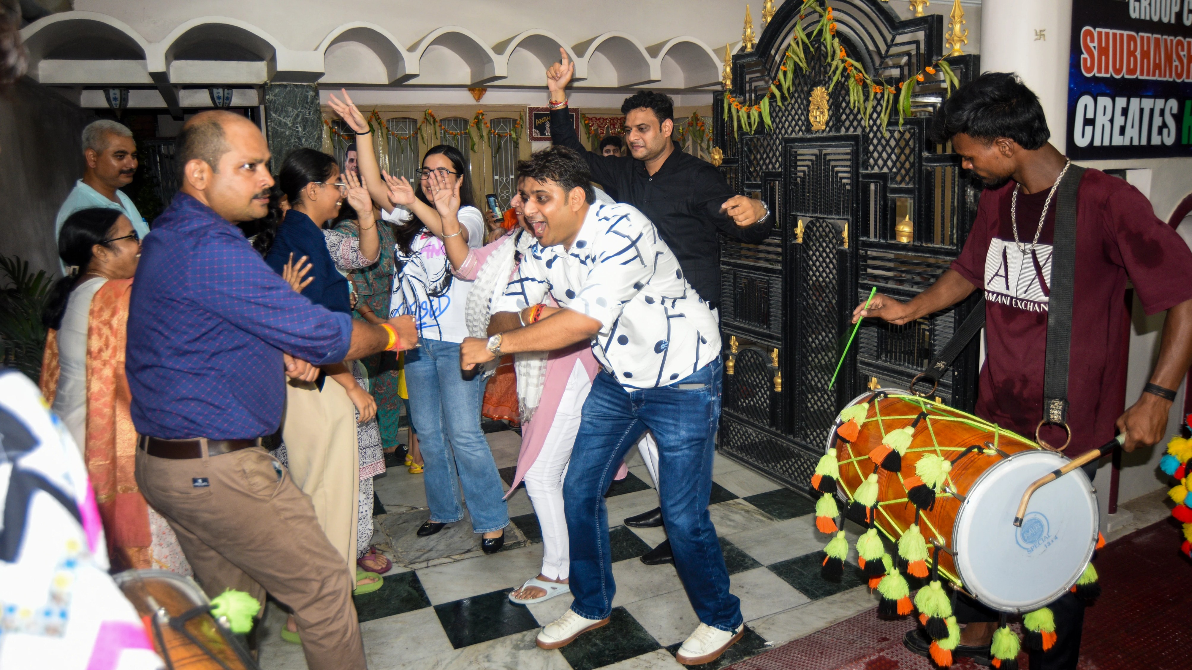 Family members were seen joyfully dancing to dhol beats.