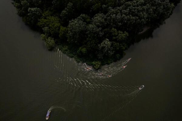 A drone view shows Peter Magyar, leader of the opposition TISZA party, paddling a canoe on the Tisza River as he starts his 80-day tour of the country near Tokaj, Hungary.